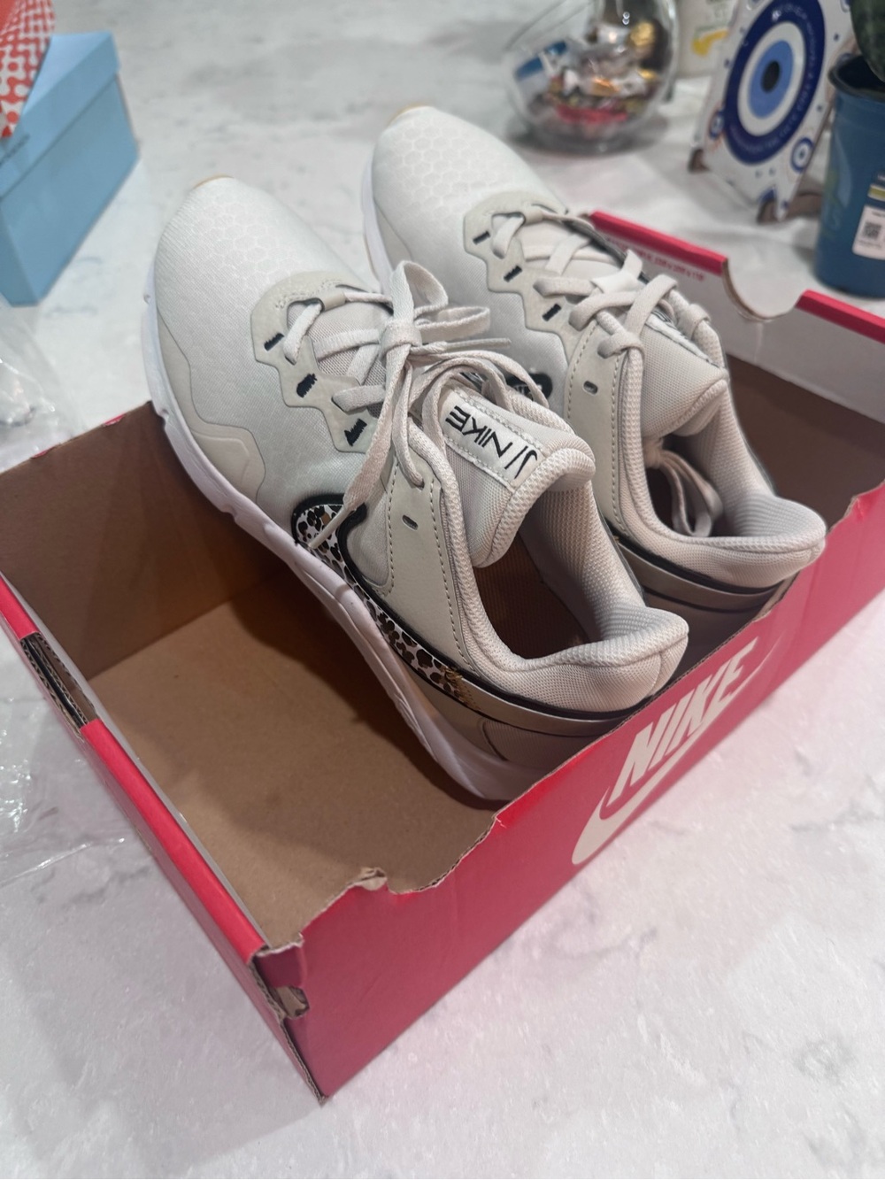 Nike Women's Cream Sneakers with Leopard Swoosh and Black Trim - Picture 2 of 4